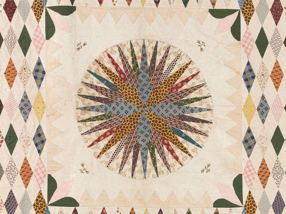 Mariners Compass Coverlet. Made 1820’s by Mary Dennis in Devonshire ©The Quilters' Guild Museum Collection