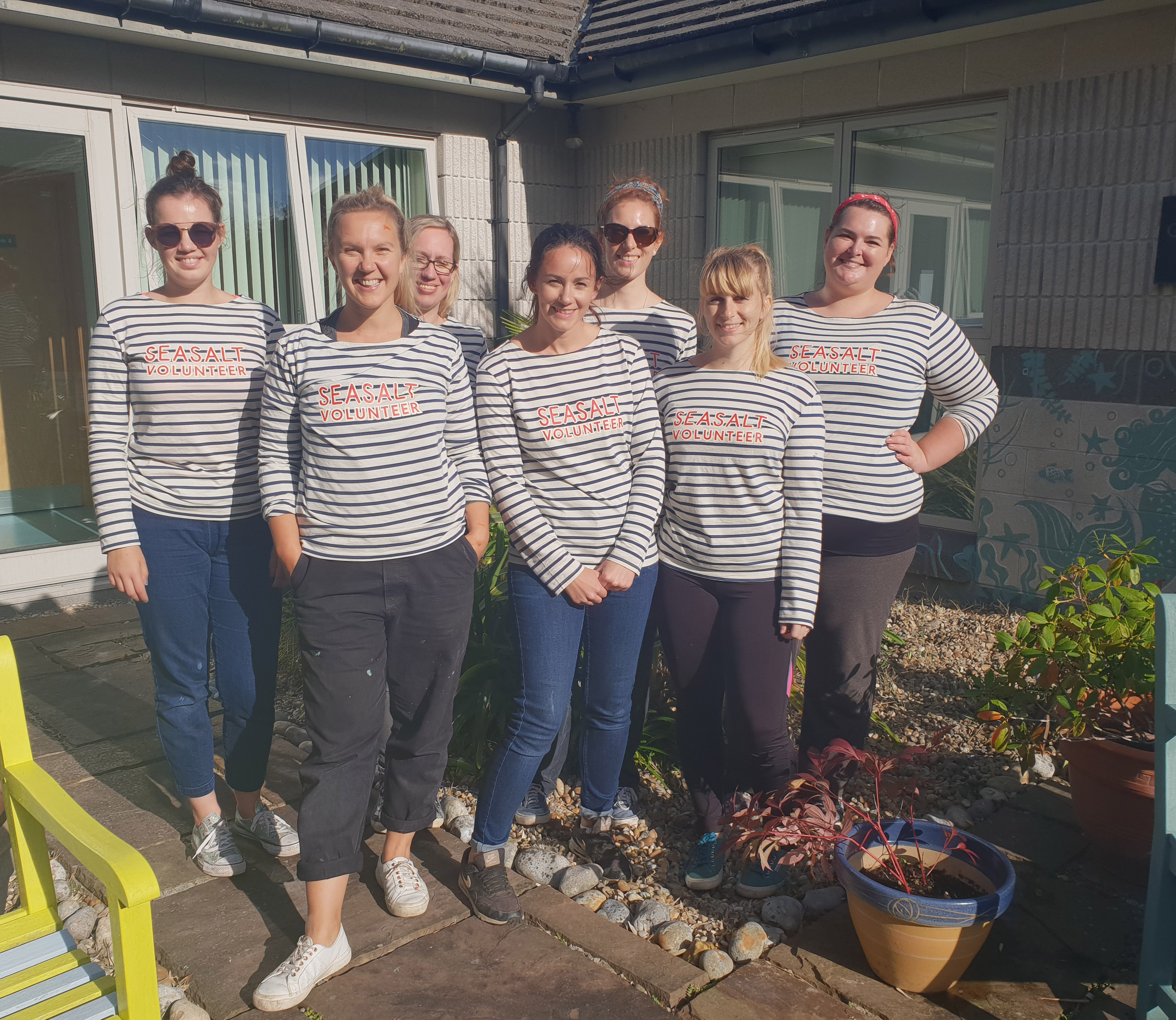 Our Marketing team after their hard work transforming the Mermaid Centre's garden. 