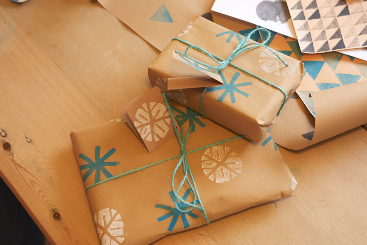 Presents wrapped in hand-printed wrapping paper 